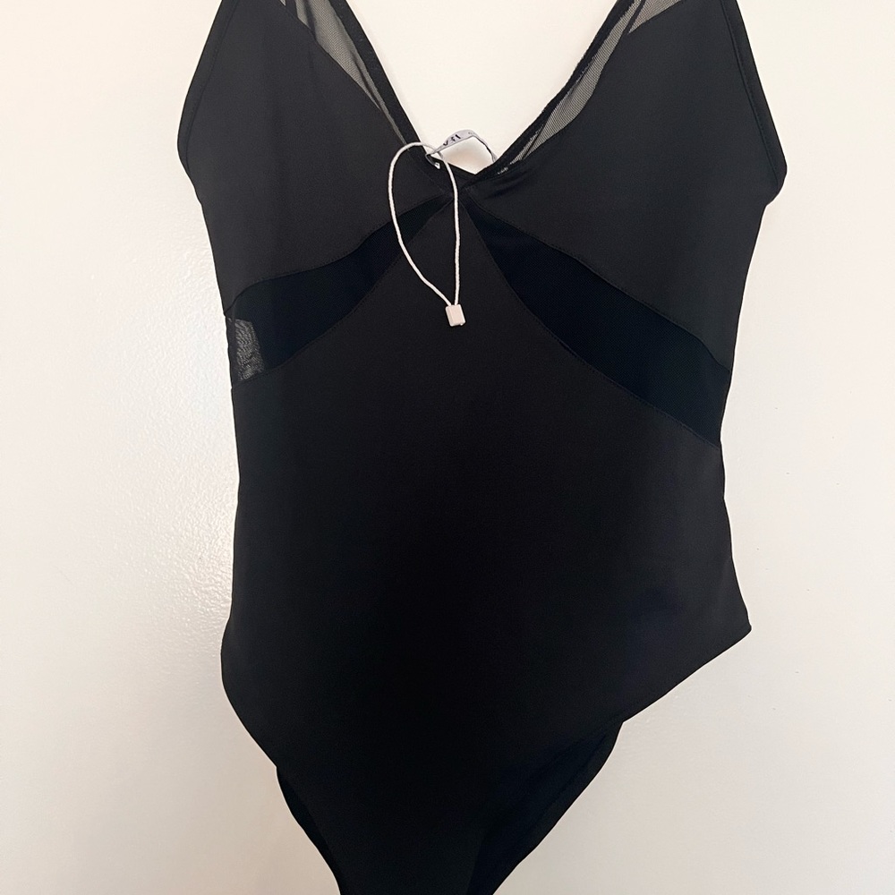 Zara bodysuit. New without tag. Size small.